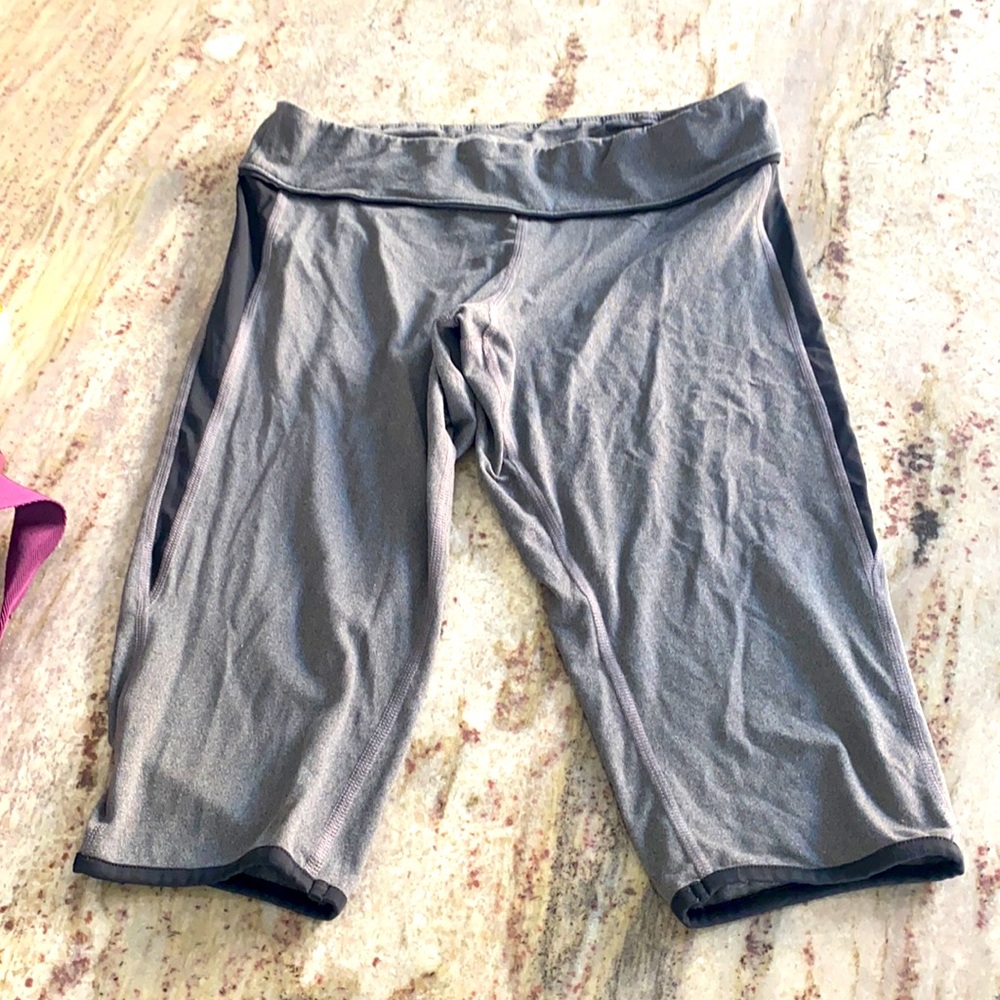 Gray/black workout pants.